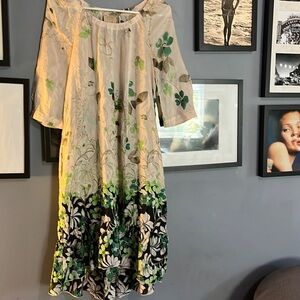 Anthropologie- xs, I believe 100% silk. No slip. I wore one from anthro. Flowy